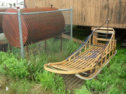 of the homes have dog sleds in their yards - ready to use when winter 