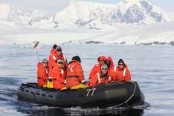 Nell Herrmann and scientists explore the waters on a zodiac near the Western Antarctic Peninsula. Photo by Nell Herrmann.
