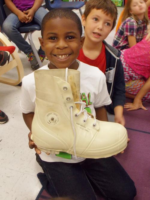GES student with bunny boot