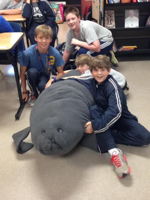 OLPH students with seal