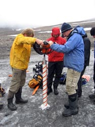 Taking an ice core of a glacier on Svalbard