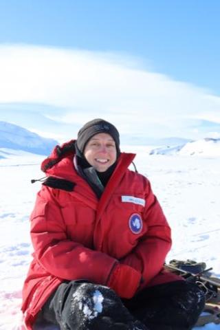 Bridget Ward sitting on the Ross Sea Ice