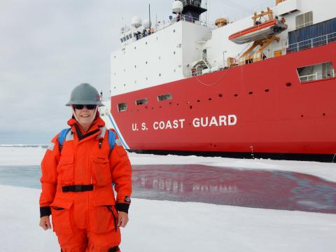 Sandi Thornton in front of USCGC Healy