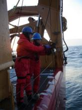 MST Adams and Kristina work to deploy a ring net