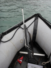 Our boat well prepared with rifle.