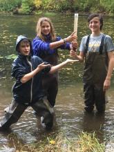 Students collecting sediment