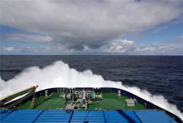 Waves breaking over the bow of the Oden