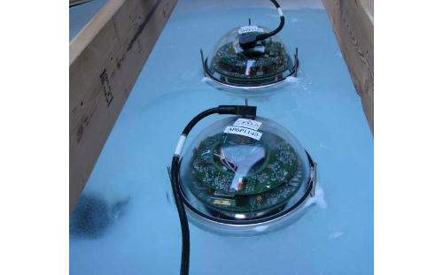 Photograph of a frozen IceTop tank ready to be closed.  Credit: The IceCube Collaboration.