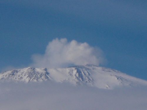 Puffs of smoke pour out of Mount Erebus.