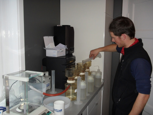 Simon filtering sediments from his glacier outlet samples.