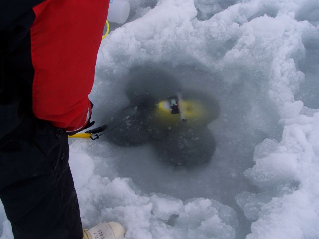Lowering the ROV into the ice hole