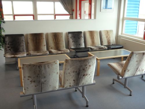 Seal skin covered seats at the Uummannaq airport.
