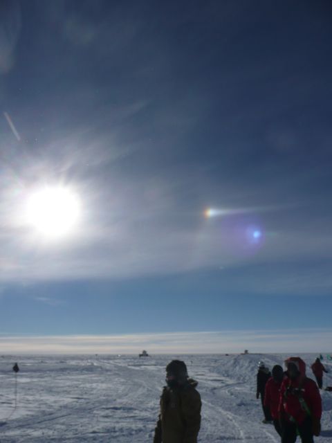 A sundog is visible to the right of the sun.