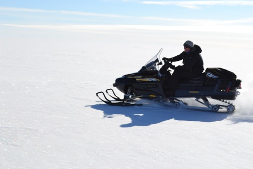 Brandon Strellis Snowmobiling on the Greenland Ice Sheet