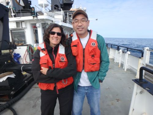 Dr. Mary Beth Decker and Dr. Hongsheng Bi aboard the Oceanus