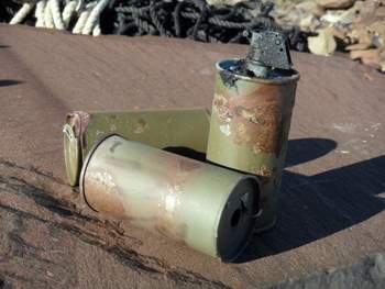 1950s era Navy smoke canisters.