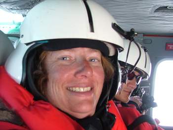 Lesley in her flight helmet on her first helicopter flight.