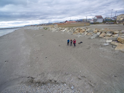 View of Jennifer Johnson, Chrissy Hernandez and Lisa Seff on the beach in Nome from the drone perspective.