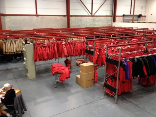 The army of Big Red coats at the Clothing Distrubution Center.