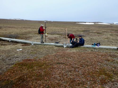 Toolik&#39;s GIS/RS team preparing the drone for take off.
