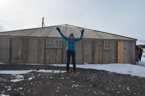 Michelle Brown in front of Discovery Hut