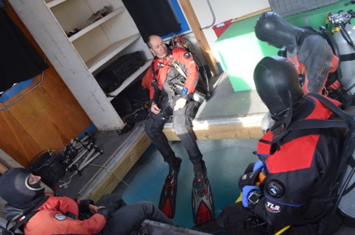 Divers in dive hole