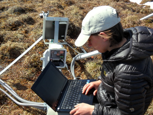 Carolyn Livensperger programming probes on mantis to collect data for Snowmelt P