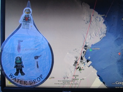  The WATER DROP in front of Bob's map of the flights.