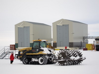  A giant tractor with cogs to create ice streets and make them smooth.