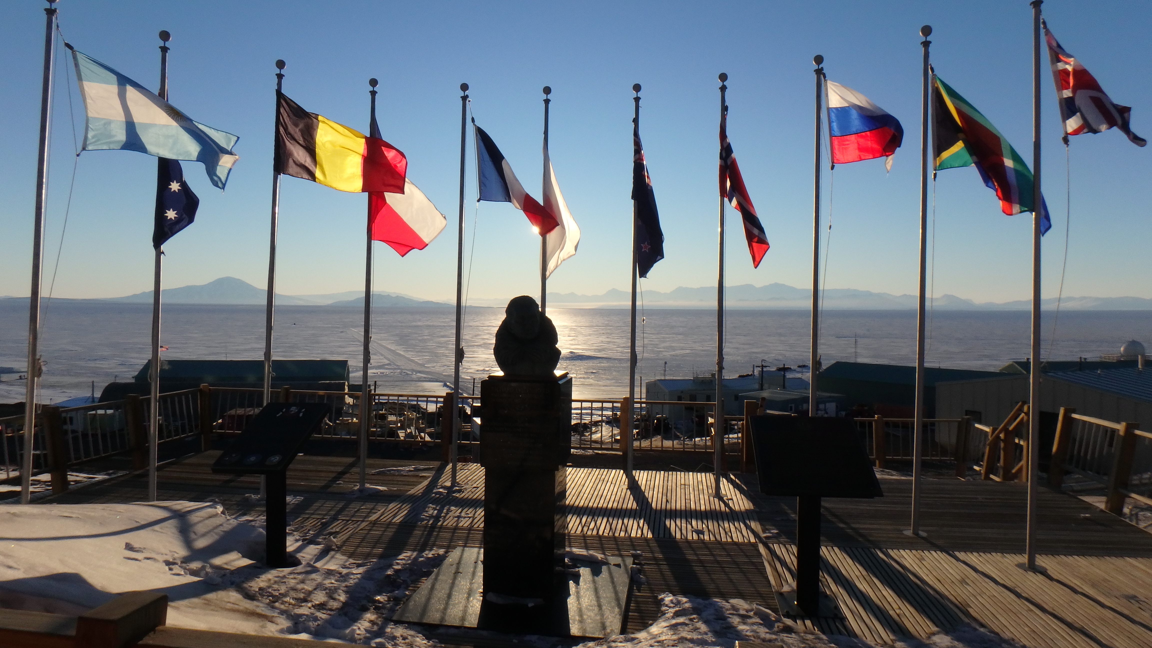 The flags of the original twelve signatory nations of the Antarctic Treaty