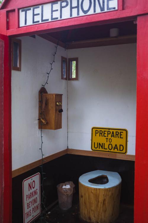 Inside phone booth outhouse