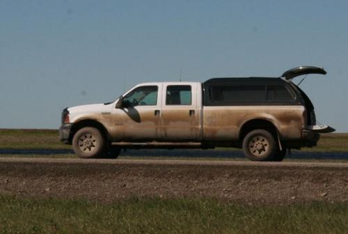 Truck parked on side of the Dalton Highway.