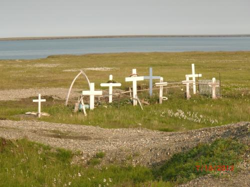 Gravesites adorned with whale bones.