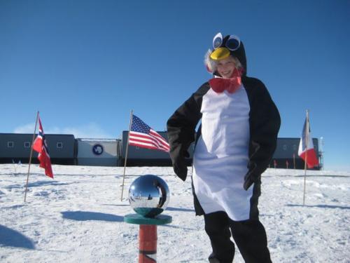 A penguin enjoying a visit to the South Pole.