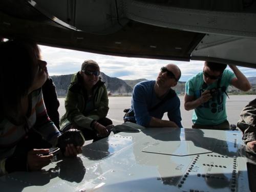 Robbie, Christine, Jakob, and Ole figure out how plane skis work