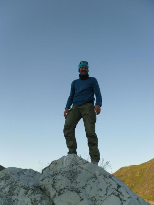 Torben Benoni on a large rock near the waterfall