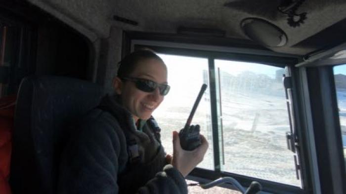 Bridget Ward checking out with Mac Ops while driving the PistenBully out to the Turtle Rock field site