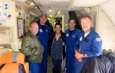 Teacher Kelly McCarthy with NOAA Flight Crew