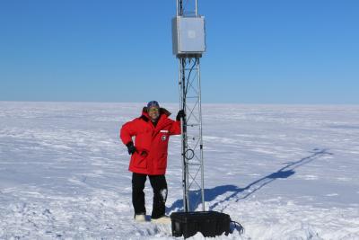 Mike Penn at an Automatic Weather Station that his team and he serviced in Antarctica.