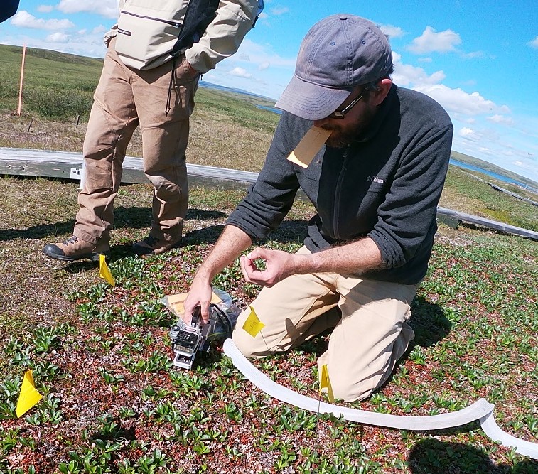 Jeremy May measures rates of photosynthesis at Toolik Field Station