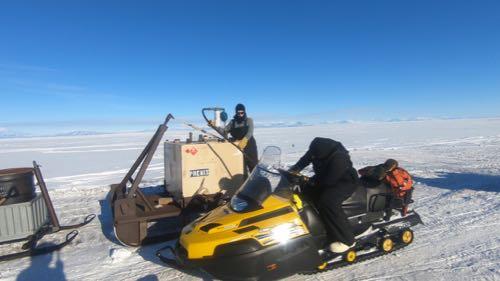 Refueling the Ski-doo at the end of the day