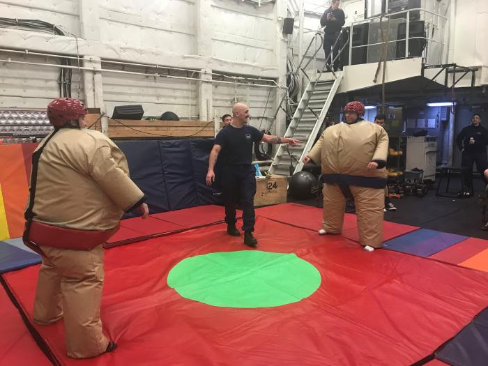 Sumo wrestling morale night in the hangar of the USCGC Healy.