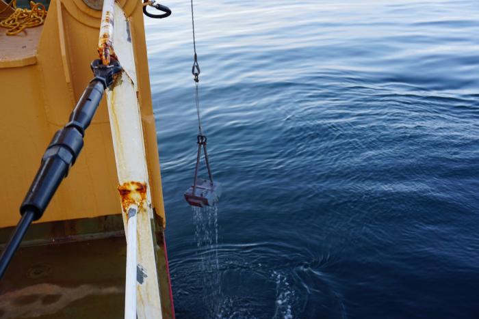 The Van Veen grab being lifted back onto the Healy after taking a benthic sample.