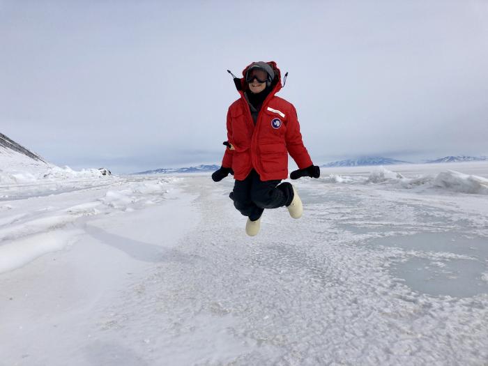 Amy Osborne jumping on the sea ice