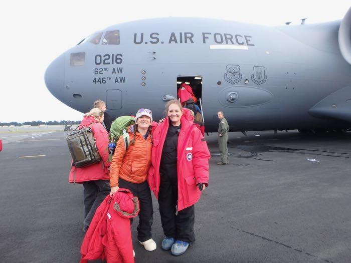 Amy Osborne and Denise Hardoy outside of C-17 airplane