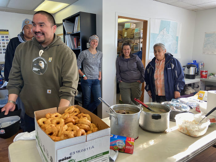 Joining locals for local cuisine of eskimo donuts, goose soup, tuttu (caribou) soup, and King Eider soup at the US Fish and Wildlife Service spring community meeting in Utqiagvik.