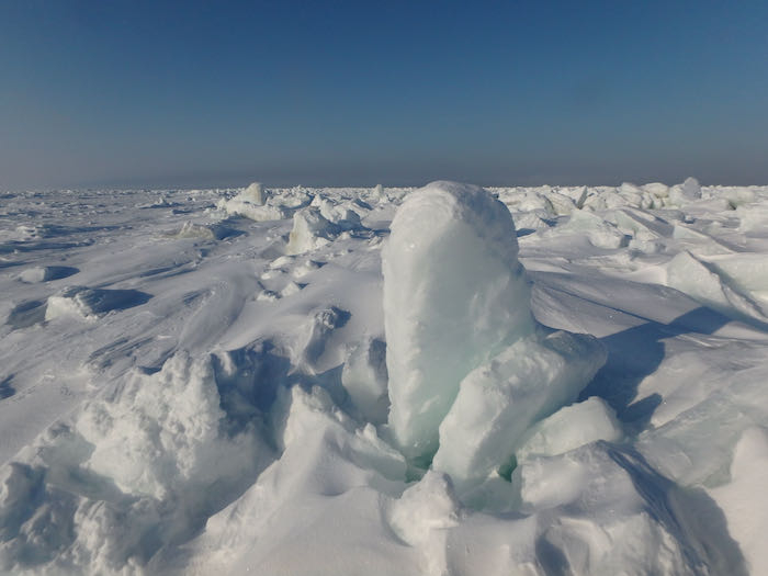 Arctic sea ice on a blue sky day