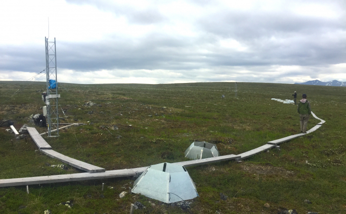 A view of the Imnaviat Creek research site. The tram tower is to the left and the OTCs (Open Top Chambers) are center. Imnaviat Creek, Alaska. Photo by Melissa Lau (PolarTREC 2018), Courtesy of ARCUS