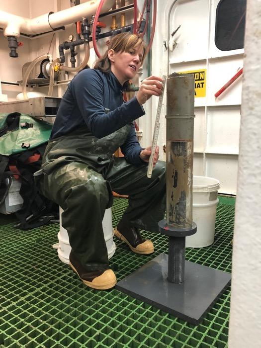 PolarTREC educator Sarah Slack helps to process a sediment sample