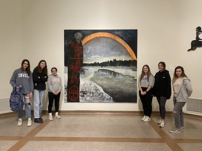 Students visit the North Atlantic Triennial Down Иorth Exhibit.